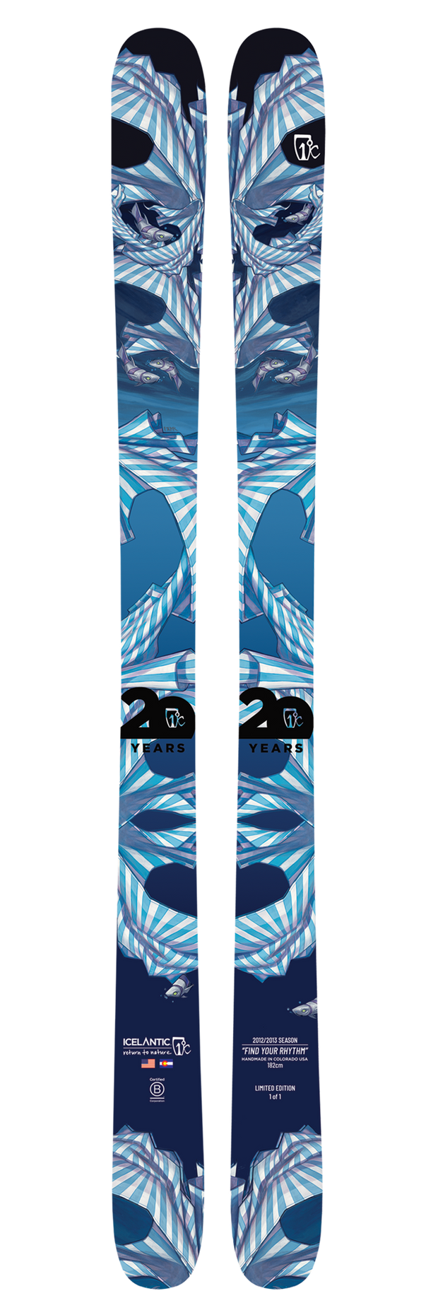 A pair of Icelantic 20 Yr 12/13 Nomad 106 skis in blue and white, featuring abstract geometric patterns with sharp lines, wave shapes, and special limited-edition text marking Icelantic’s 20th Anniversary. The all-mountain design prominently displays the Icelantic brand and “20 Years.”.