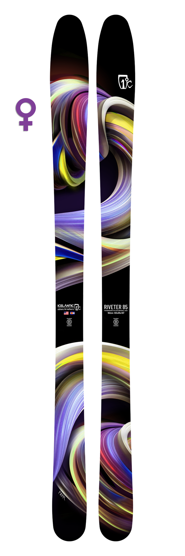 A pair of women’s all mountain skis, the Icelantic 25/26 Riveter 85, handmade in Colorado and featuring a vibrant, swirling abstract design in purple, yellow, black, and white tones on a white background.
