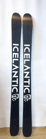 Two black Icelantic Demo - 23/24 Pioneer 109 skis stand upright side by side on a light surface. Each ski displays the word ICELANTIC in bold white letters and features a white mountain logo near the bottom, highlighting that they are handmade in Colorado. The background is plain white.