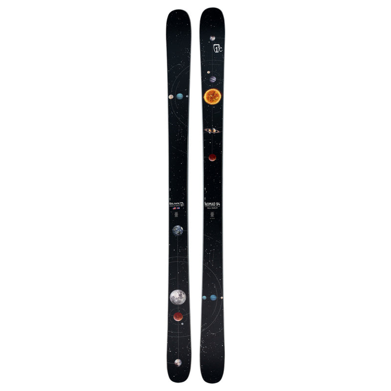 The Icelantic Skis Nomad 94 is a pair of black skis adorned with a solar system design, showcasing planets, the sun, and orbital paths on a starry backdrop.