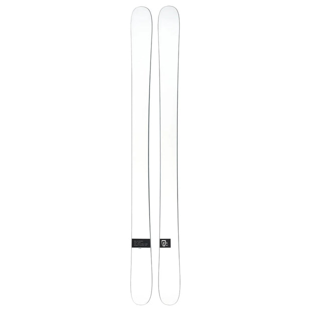 A pair of Icelantic Skis Nomad 106 Whiteout skis in white with a minimal design, displayed side by side, featuring a small black label with text and the brand logo near the base.