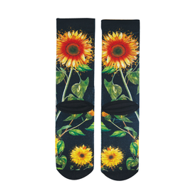 Introducing the Sunflower Nia Pro Socks by Icelantic—a pair of black crew-length lifestyle socks adorned with large, vibrant sunflower designs and green leaves arranged symmetrically, inspired by Travis Parr artwork.