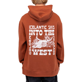 A person wearing an Icelantic Skis Mezcal Skull Hoodie—a unisex, oversized brown hoodie made from recycled polyester—features white text and graphics on the back that read "Icelantic Skis Into The West Golden Colorado," along with an illustration of a bison and plants, making it both stylish and sustainable.