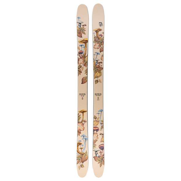 A pair of Icelantic Nia Pro 105 unisex skis in beige, handmade in Colorado and featuring an illustrated pattern of colorful mushrooms and autumn leaves along the length of each ski.