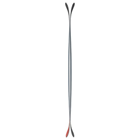 A top-down view of the Icelantic Skis Nomad 100 snowboard, featuring a twin-tip shape and a mostly black design with a red accent on one end, set against a white background.