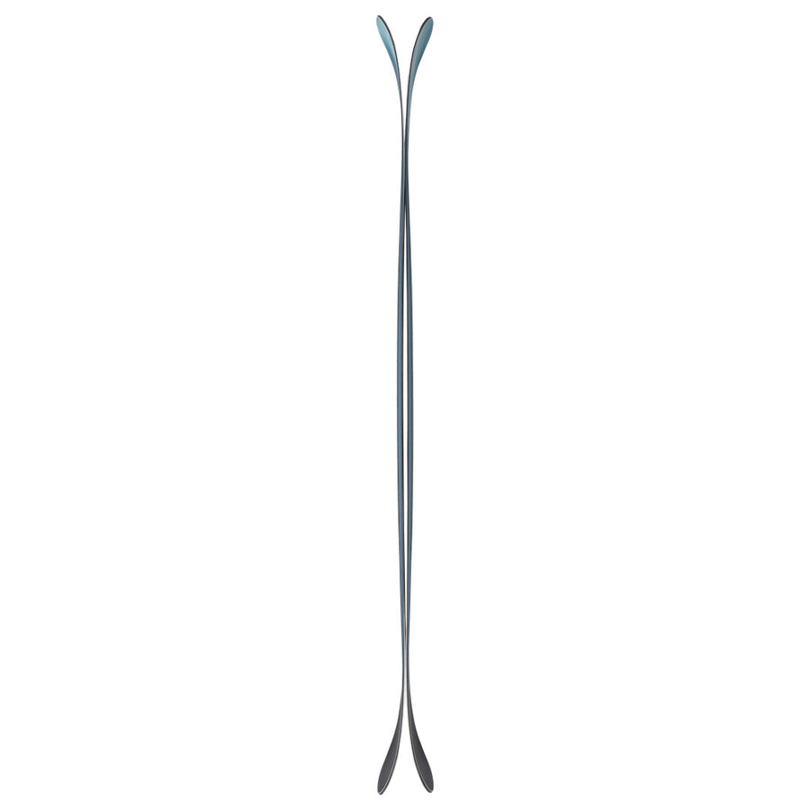A pair of Icelantic Skis Rocky Mtn NP 100 stand upright, viewed from the side to reveal their curved tips and sleek, narrow profile against a white background—handmade in Colorado as an all-mountain ski.