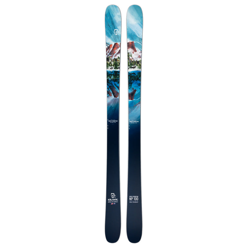 The Icelantic Skis Rocky Mtn NP 100 is a pair of all-mountain skis handmade in Colorado, featuring a striking blue and white mountain landscape graphic with snowy peaks, trees, and a logo near the tips for exceptional quality and performance.