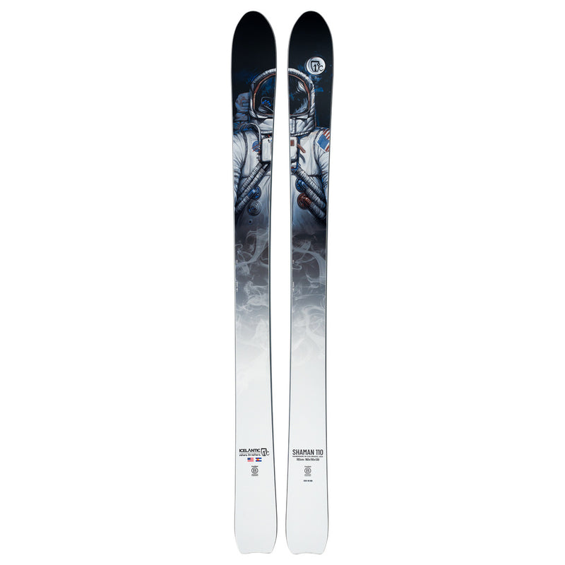 The Icelantic Shaman 110 is a pair of white skis showcasing artwork of an astronaut in a spacesuit on the upper section, with the design gradually fading to plain white toward the tips and bottom. Featuring a 110mm waist profile, these skis are crafted for exceptional powder performance while delivering solid carving across varied terrain.