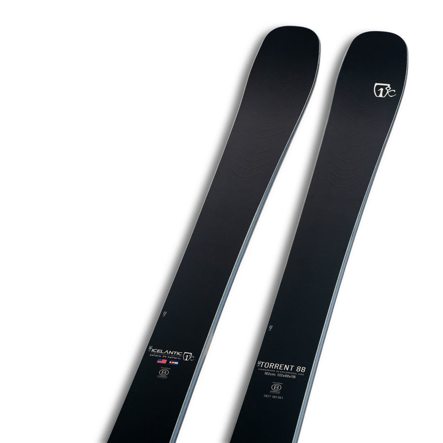 Close-up of two black Icelantic Skis Torrent 88 skis featuring subtle white branding and logos, displayed at an angle on a white background. The skis have a smooth, matte finish with the text “Torrent 88” and “Icelantic” near the bindings. Designed for all-mountain performance, these skis deliver a precise, agile ride ideal for intermediate to advanced skiers.