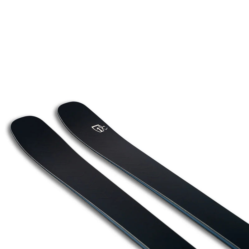 A pair of Icelantic Skis Torrent 88 in black, featuring a subtle logo near the tips, set against a white background.