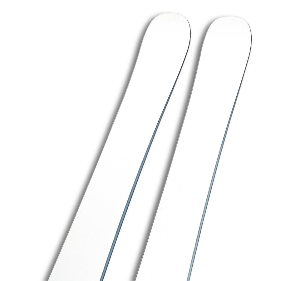 Two Icelantic Skis Nomad 112 Whiteout freeride skis with rounded tips are placed side by side against a plain white background, making them an excellent choice for advanced skiers seeking top performance in deep powder.