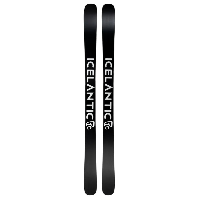 A pair of black Torrent 96 skis by Icelantic Skis are placed side by side, each featuring the word ICELANTIC in bold white lettering down the length and a small logo near the bottom.