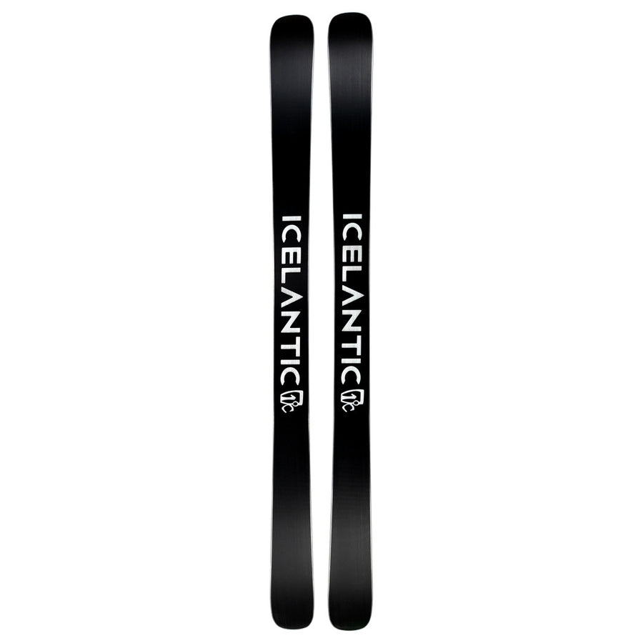 A pair of Icelantic Skis Nomad 94 Whiteout skis in black with the word ICELANTIC printed in white letters down the length of each ski, shown on a plain white background.