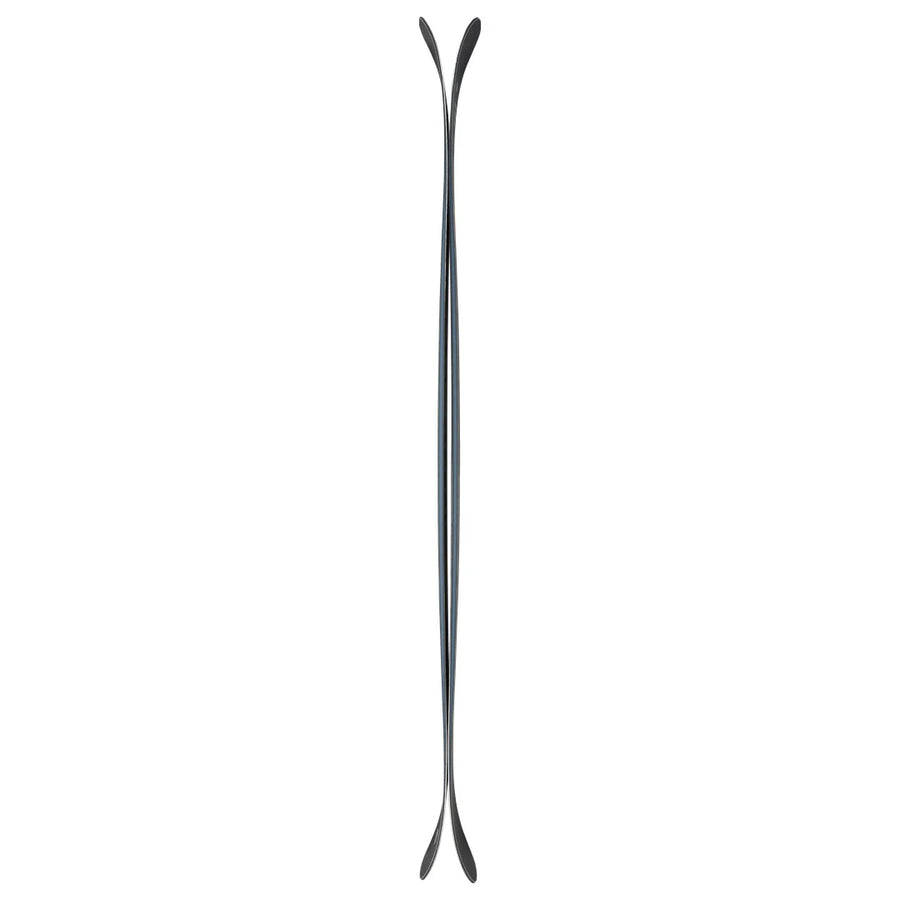 The Nomad 100 Whiteout by Icelantic Skis is displayed against a white background, featuring a symmetrical, elongated design with curved ends and a narrow waist—its silhouette resembles two spoons joined at the handles, creating an hourglass-like, mirrored form.