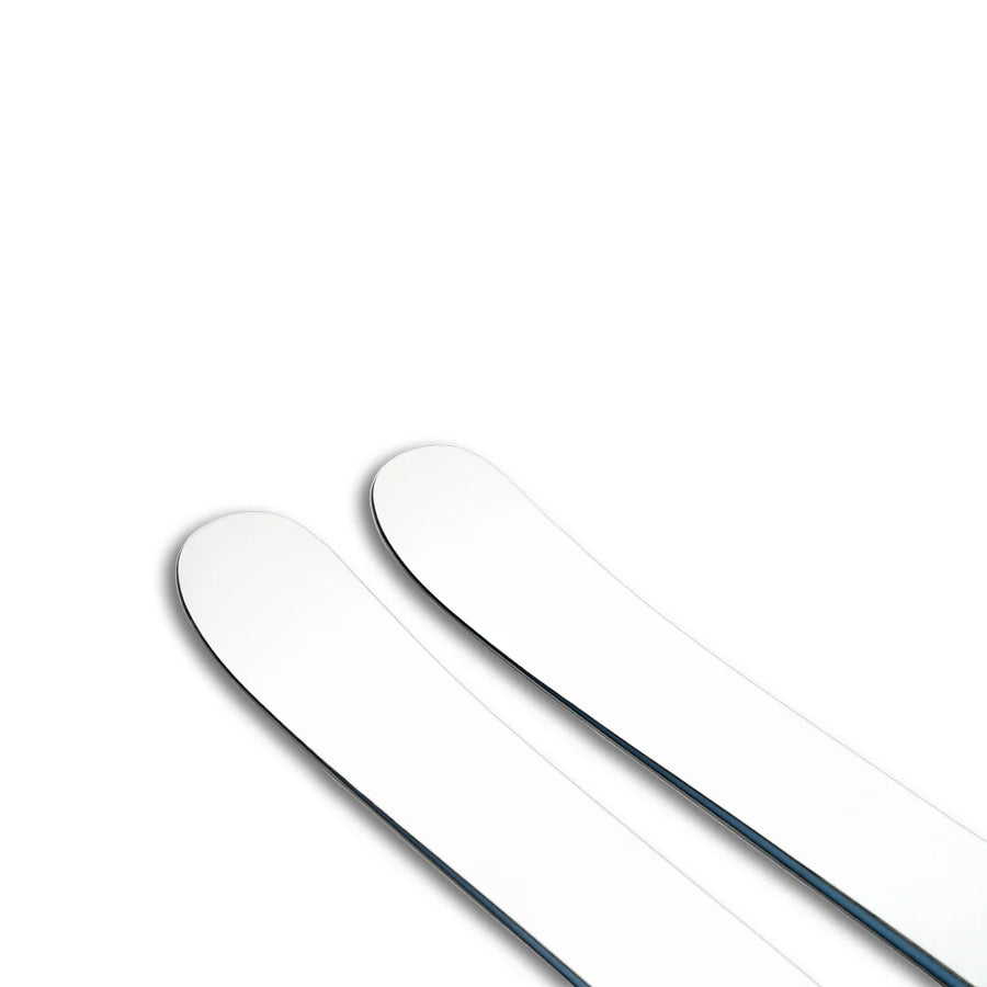 Two Icelantic Skis Nomad 106 Whiteout skis with rounded tips are placed side by side on a white background, photographed from above.