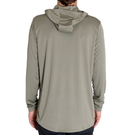 A person models the Icelantic UV Sun Hoodie in Olive Grey, shown from the back with their arms relaxed at their sides against a plain white background.