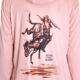 The Icelantic Womens UV Sun Hoodie - Cowgirl features a vibrant pink design with an illustration of a cowgirl riding a bucking horse above the words INTO THE WEST, complete with water and reflection details at the bottom. Made from quick-dry fabric, this hoodie is perfect for staying active and protected in the sun.