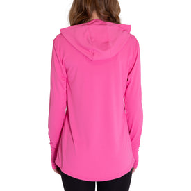 A person with long brown hair is wearing the Icelantic Womens UV Sun Hoodie in Hot Pink. The photo, taken from behind, shows the back and hood of the sweatshirt against a plain white background.