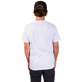 A person wearing the Icelantic Permit Tee made from GOTS certified organic cotton, along with black pants and a black cap, stands facing away to display the back of the unisex t-shirt against a plain white background.