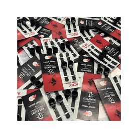 Several packages of Icey Finger Planks by Icelantic Skis, including black miniature skateboard parts and 3D-printed finger planks, are spread out on a white surface. The mostly black and red packaging displays the Icelantic Skis branding and product information.