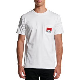 A person wearing the Icelantic Skis Cowboy Killer Pocket Tee—a plain white heavyweight cotton shirt featuring a small red graphic and the word "ICELANTIC" on the left chest pocket area—stands against a white background.