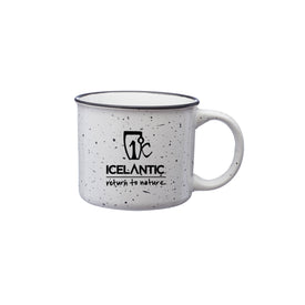 Sturdy white speckled ceramic Camp Mug from Icelantic Skis featuring a handle, black rim, and the Icelantic "Return to Nature" logo and text printed on the side—perfect as your go-to camp mug.