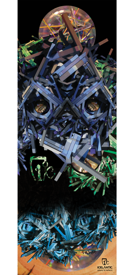 A striking abstract art piece titled "13/14 Pilgrim Fine Art Print" by Icelantic features layered blue, green, and purple geometric shapes forming a symmetrical, mask-like face. Reflective surfaces and circular elements add depth to the design. Available as a fine art print or on wrapped canvas, with the Icelantic logo and text displayed at the bottom.