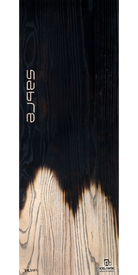 Close-up of the 18/19 Sabre ski by Icelantic, showcasing striking dark and light wood grain patterns with "sabre" displayed vertically. The lower right corner features the Icelantic logo, making this image ideal for fine art prints or as a dramatic giclee print on wrapped canvas.