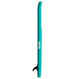 The Ionic X Parr Paddleboard - All Water Teal by Icelantic Skis is displayed from the side, featuring "ionic" written vertically in white and a visible black fin at the bottom, showcasing the board’s versatility for all types of water adventures.