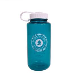 A teal RTN Seal Nalgene water bottle by Icelantic Skis, made from BPA-free Tritan, features a white screw-on lid with a loop and a white circular "Return to Nature Icelantic Skis" logo surrounding a flame graphic.