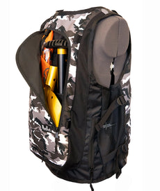 The Icelantic Skis WhatVest - Snow Camo is a black, white, and gray camouflage backpack with a side zipper open to reveal sports equipment inside. Styled and functional like a snowboard utility vest, it features mesh side pockets and is shown displayed on a gray mannequin torso.